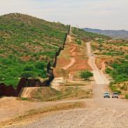 Border Fence beside a road near Nogales, Arizona 